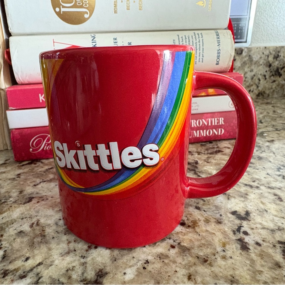 Skittles Taste the Rainbow coffee cup 2020 logo and design.